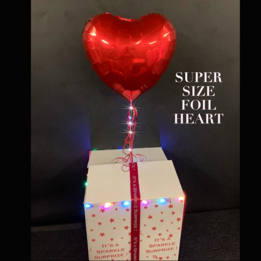 Super size foil red heart balloon in a box